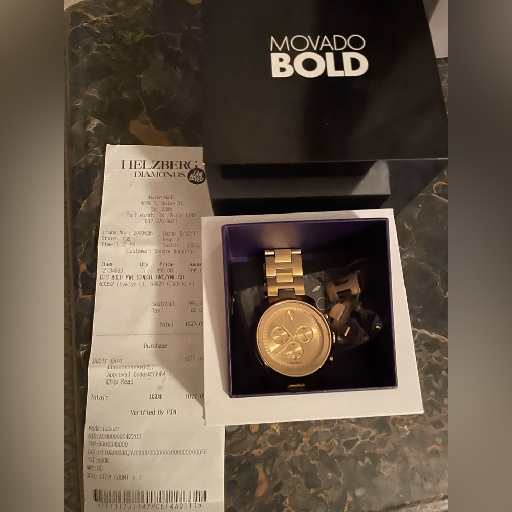 Movado Bold Gold watch with links .